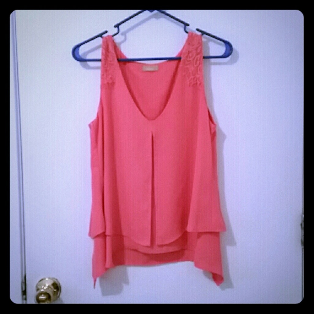 Sleeveless coral blouse